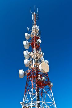 Communications tower with a beautiful blue sky