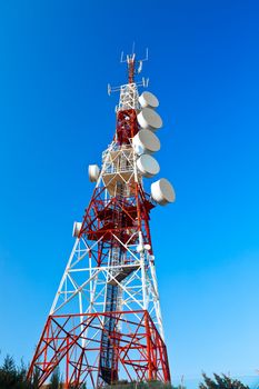 Communications tower with a beautiful blue sky