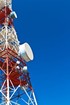Communications tower with a beautiful blue sky