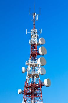Communications tower with a beautiful blue sky