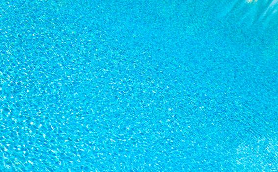 Abstract composition of the water of a swimming pool and its reflections