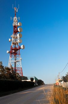 Communications tower with a beautiful blue sky
