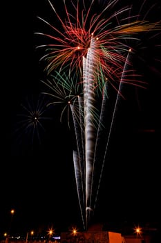 Firework streaks in the night sky