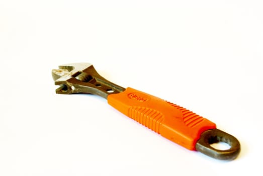 wrench with an orange handle on a white background