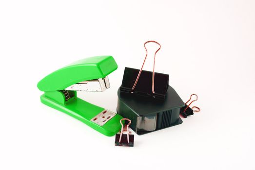 stapler, tape  and  clamps on a white background