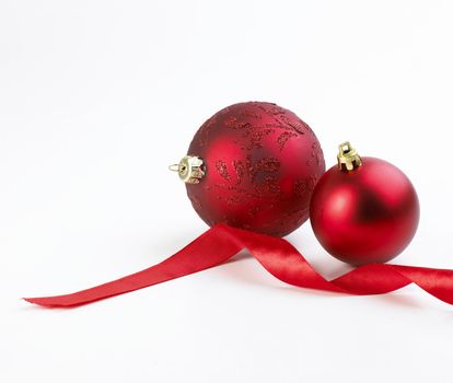 ribbon and christmas bubbles red on white background