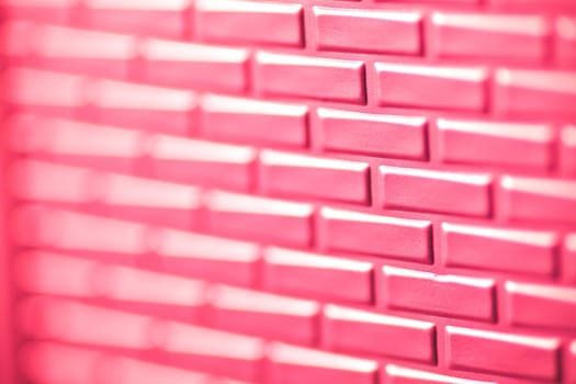 A wall formed by metal bricks