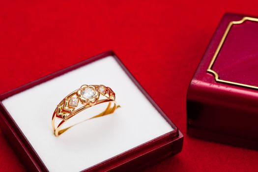 Fantastic gold ring adorned with several white zirconia
