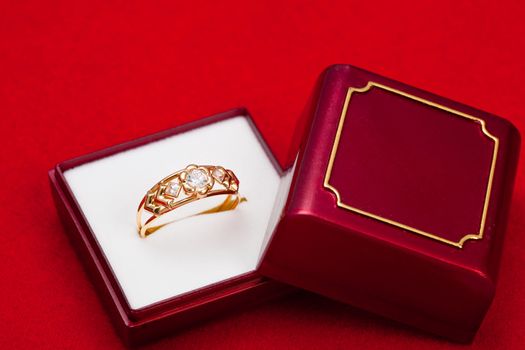 Fantastic gold ring adorned with several white zirconia