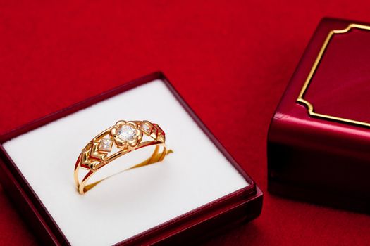 Fantastic gold ring adorned with several white zirconia