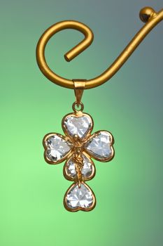 Pendant of a crucifix with five zirconia enchased