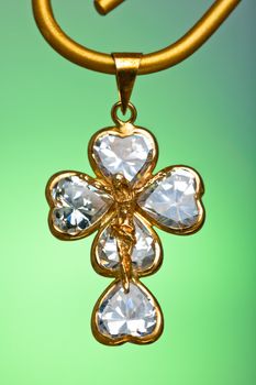 Pendant of a crucifix with five zirconia enchased