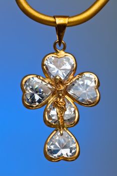 Pendant of a crucifix with five zirconia enchased