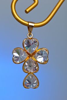 Pendant of a crucifix with five zirconia enchased