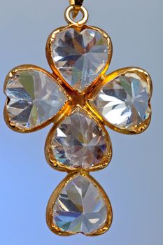 Pendant of a crucifix with five zirconia enchased