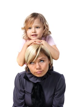 little girl hugs the young mother on the white background
