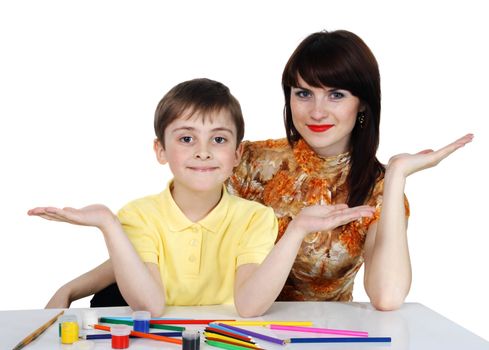 small boy and a young girl with colored pencils on the white background
