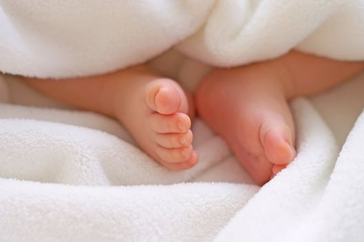 baby foots in towel