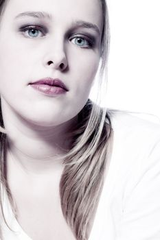 Studio portrait of a beautyful model with a white blouse