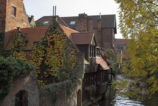 Ancient houses on a channel in Brugge (Bruges), Belgium