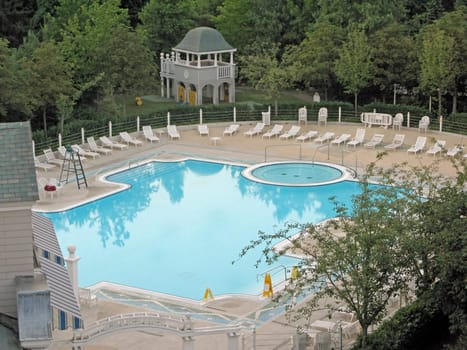 A swimming pool of a hotel from above.