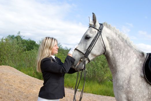 girl with horse.Friendship of an animal and the person