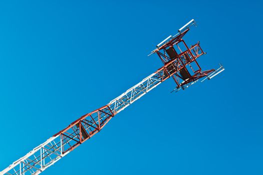Communications tower with a beautiful blue sky