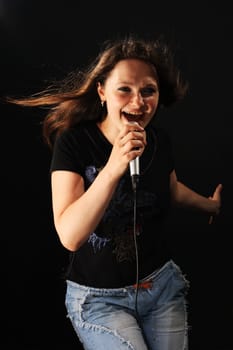 Soloist rock band on the black background
