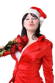 Portrait of a beautiful young woman in a red suit and hat of Santa Claus with red roses on the white background
