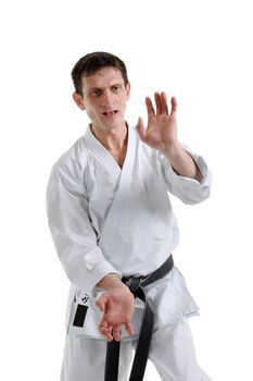 Karate. Man in a kimono with a white background
