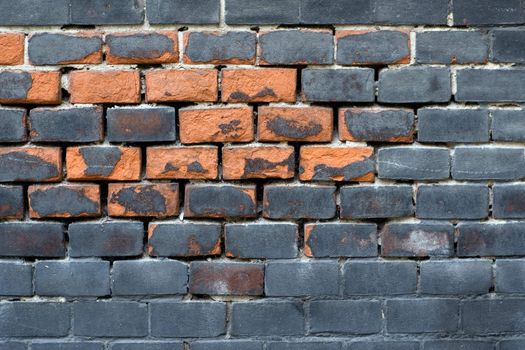 Besmirched brick wall