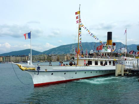 Famous wheelboat named "La Suisse" on Geneva lake, Switzerland. May 2010 was 100 years celebration of "La Suisse" prestigious old wheelboat, Geneva, Switzerland. This famous boat was entirely restored bewteen 2007 and 2009.