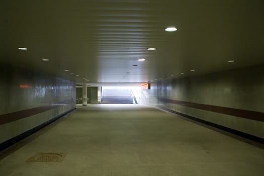 Empty wide pedestrian underground tunnel
