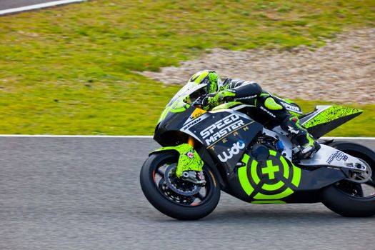 JEREZ DE LA FRONTERA, SPAIN - MAR 5: Moto2 motorcyclist Andrea Iannone races on the official training of the  world championship of MotoGP on Mar 5, 2011, in  Jerez de la Frontera