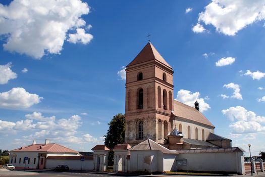 A red brick catholic village church in Belarus