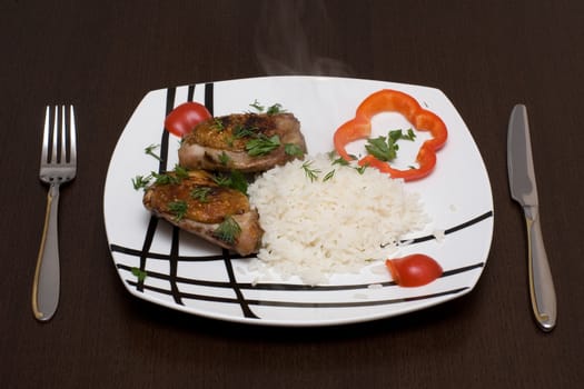 Chicken with rice on a plate