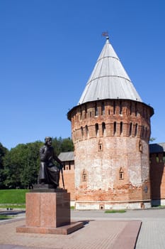 The Smolensk Kremlin tower and monument to founder of it - Fyodor Kon'