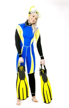 standing young woman wearing neoprene with snorkeling equipment