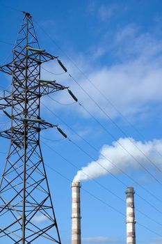 Electricity pylon and two factory pipes