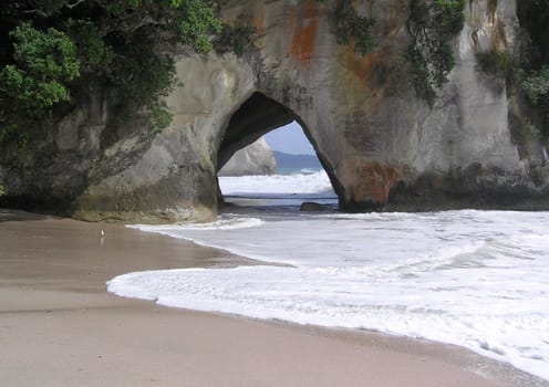 Cave that goes right trough mountain on the beach.