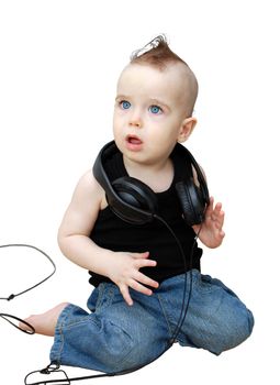 Portrait of serious baby in the earphones