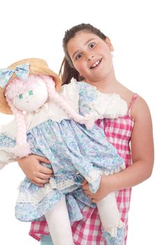 joyful little girl with her favorite doll (isolated on white background) 