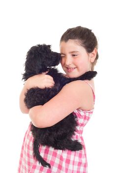 adorable little girl getting a kiss from her dog (isolated on white background)