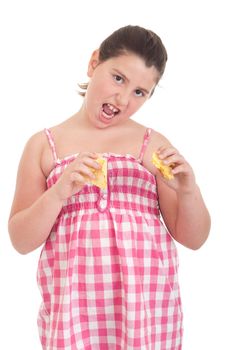 cute little girl with hungry expression eating chips (isolated on white background)