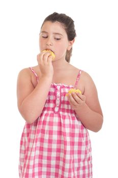 cute little girl with hungry expression eating chips (isolated on white background)