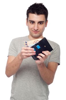 shocked young man looking at his wallet with money and cards (isolated on white background)