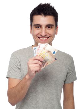 smiling young man showing his money, euro bills (isolated on white background)