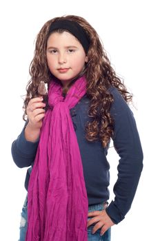 adorable little girl portrait dressed as teenager with long wig and glitter, eating an ice cream (isolated on white background)