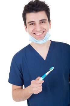 young male dentist with mask and toothbrush isolated on white background