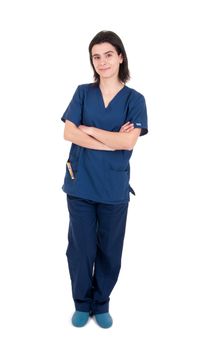 full length portrait of a handsome female doctor wearing uniform and clogs (isolated on white background)